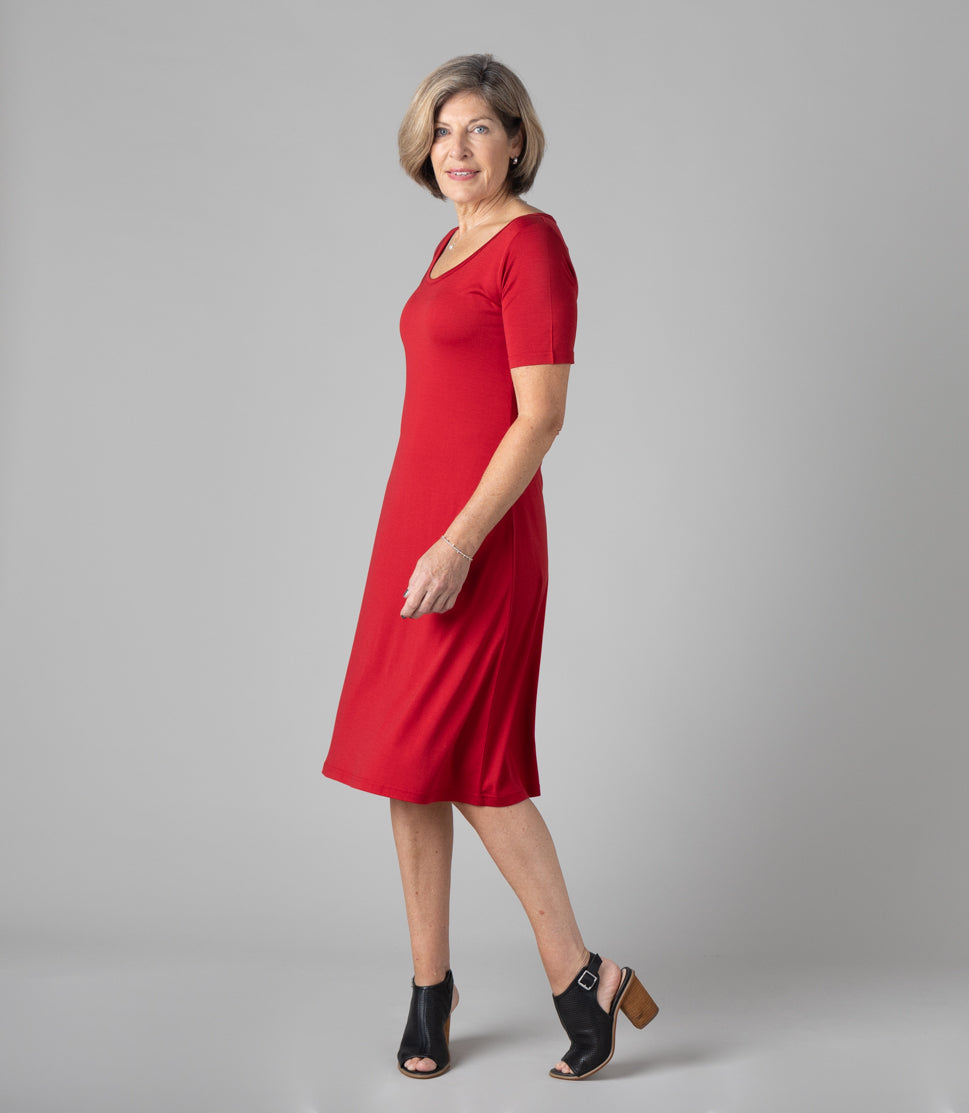 Woman wearing Silkspun Short Sleeve Classic Dress in Sunset