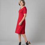 Woman wearing Silkspun Short Sleeve Classic Dress in Sunset