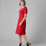 Woman wearing Silkspun Short Sleeve Classic Dress in Sunset