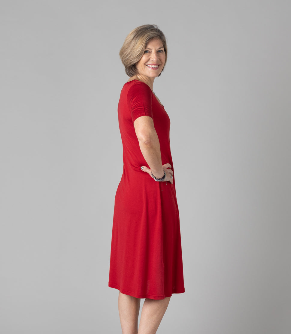 Woman wearing Silkspun Short Sleeve Classic Dress in Sunset