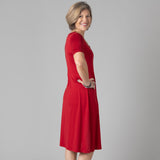 Woman wearing Silkspun Short Sleeve Classic Dress in Sunset