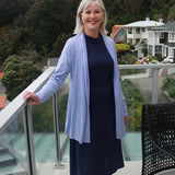 Silkspun High-Neck Dress in Navy paired with a Longline Cardigan in Forget-Me-Not blue
