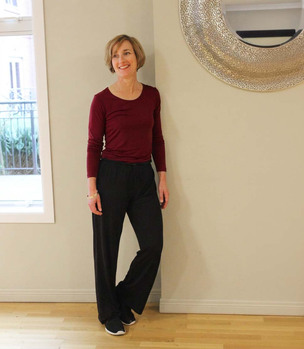 Woman wearing Silkspun Long Sleeved Scoop in Bordeaux red