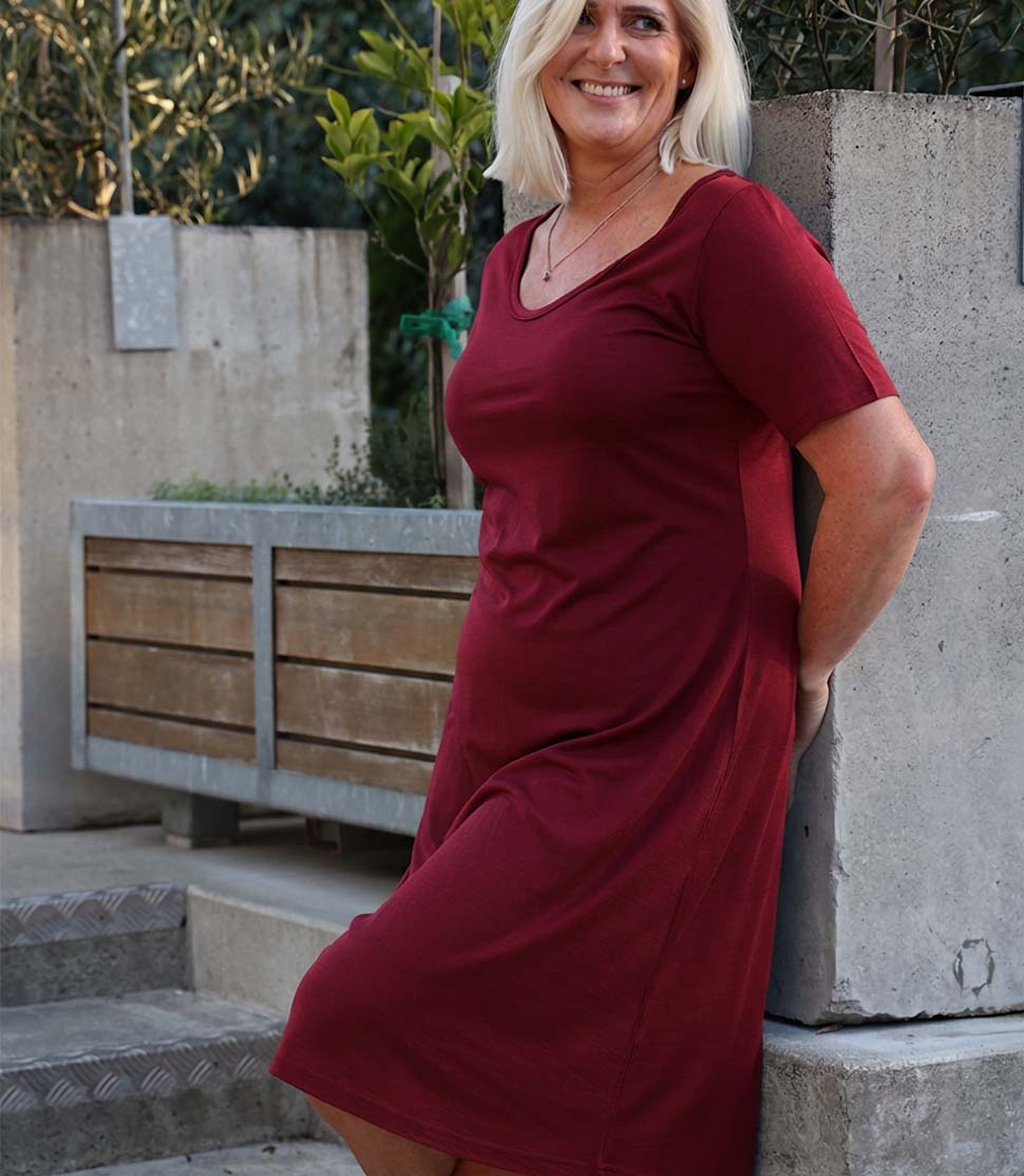 Model wearing Silkspun Short Sleeve Classic Dress in Bordeaux red