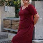 Model wearing Silkspun Short Sleeve Classic Dress in Bordeaux red