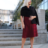Model wearing Silkspun Short Sleeve Classic Dress in Bordeaux red with Black Silkspun Wrap Scarf