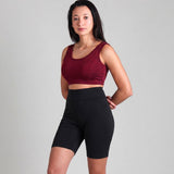 Women's Silkspun Flexi Bra in Bordeaux red worn with Silkspun Glide Shorts in Black