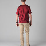 Man wearing a Silkspun Short Sleeve Crew in Bordeaux Red