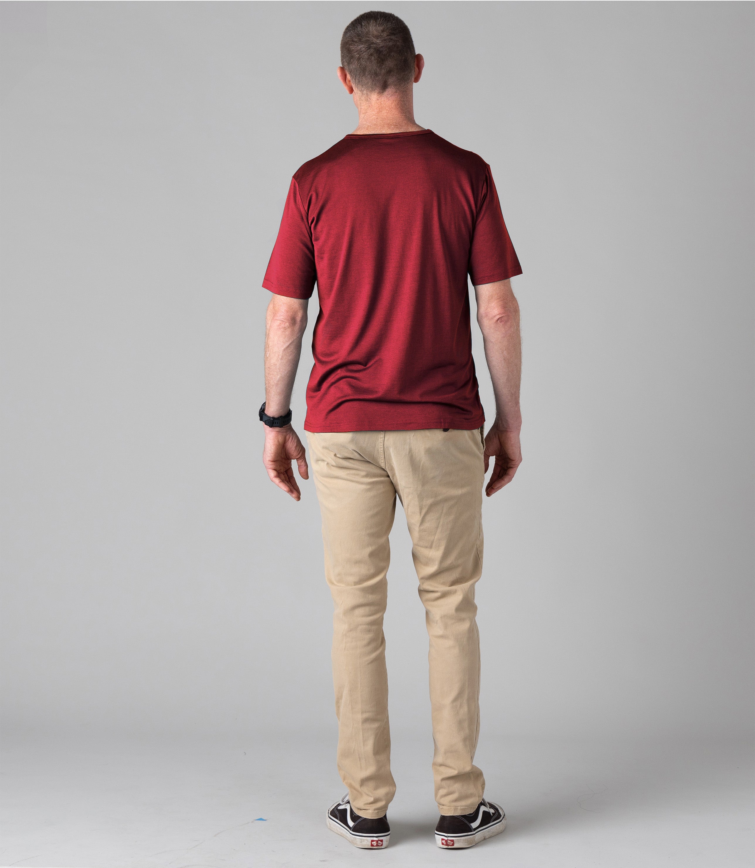 Man wearing a Silkspun Short Sleeve Crew in Bordeaux Red