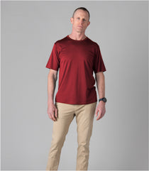 Man wearing a Silkspun Short Sleeve Crew in Bordeaux Red