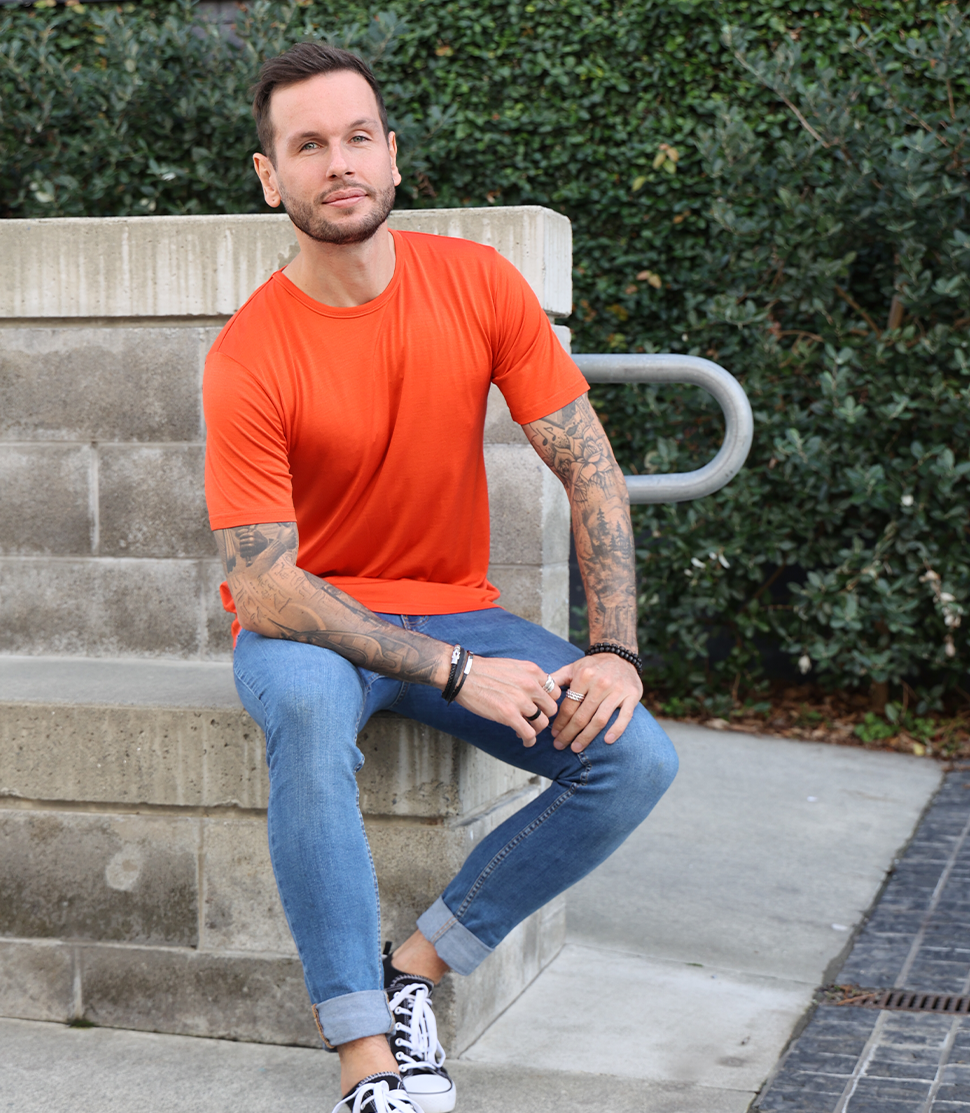 Men's Silkspun Short Sleeve Crew in Orange Blaze on model