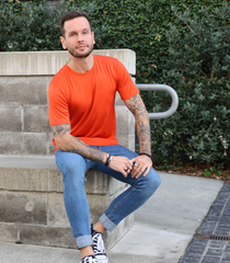 Men's Silkspun Short Sleeve Crew in Orange Blaze on model