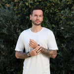 Man wearing Men's Silkspun Short Sleeved Crew