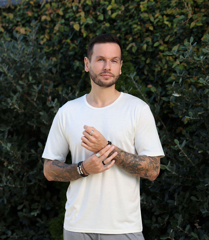 Man wearing Men's Silkspun Short Sleeved Crew