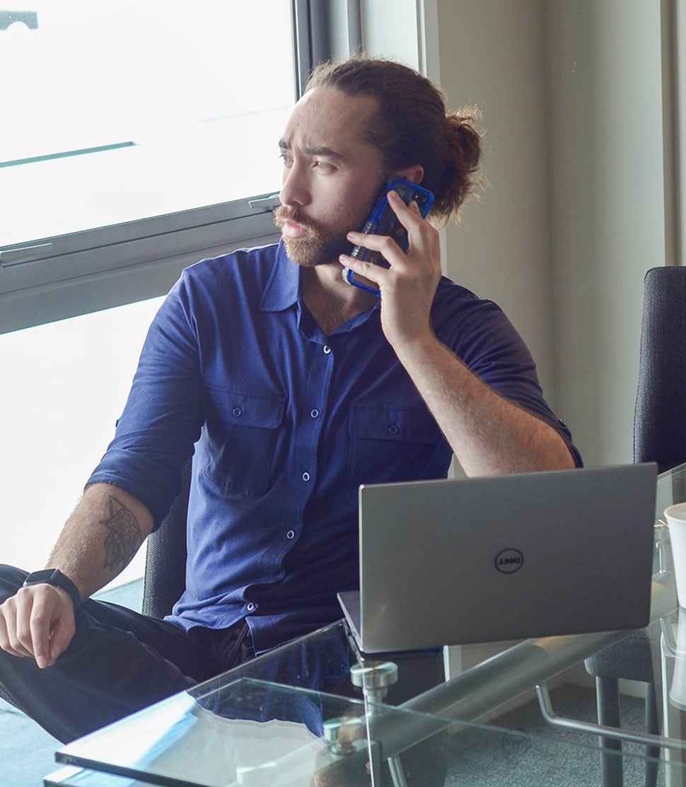 Silkspun Men's Shirt designed for travel.  100% natural fabric featuring collar, roll-up button-cuff sleeves and covered pockets