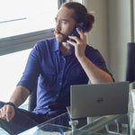 Silkspun Men's Shirt designed for travel.  100% natural fabric featuring collar, roll-up button-cuff sleeves and covered pockets