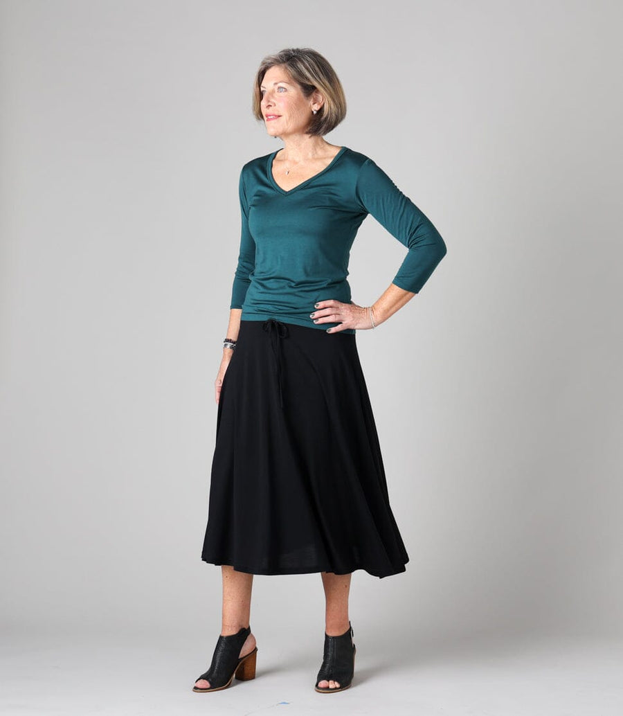 Silkspun Swing Skirt in Black with 3/4 V Neck Top in Deep Sea green